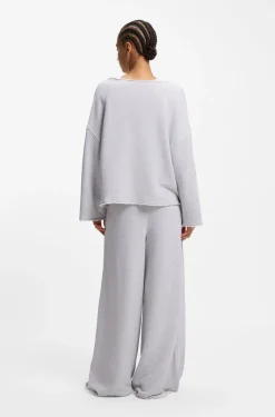 Loose-fit cotton-blend sweatshirt with raw-cut edges
