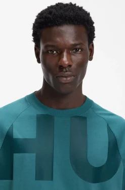 Loose-fit T-shirt in cotton jersey with wraparound logo