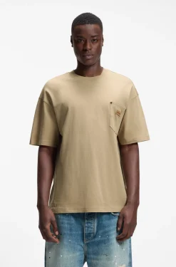 Loose-fit T-shirt in cotton with suede logo badge