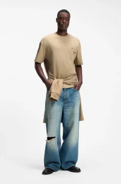 Loose-fit T-shirt in cotton with suede logo badge