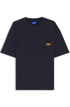 Loose-fit T-shirt in cotton with suede logo badge