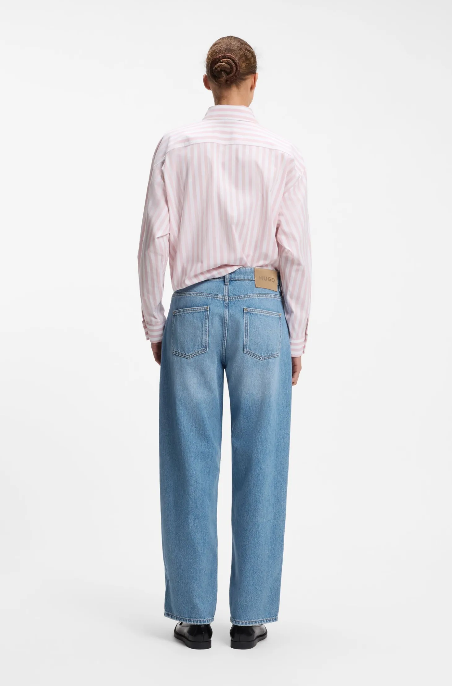 Loose-fit wide-leg jeans with charm accents