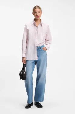 Loose-fit wide-leg jeans with charm accents