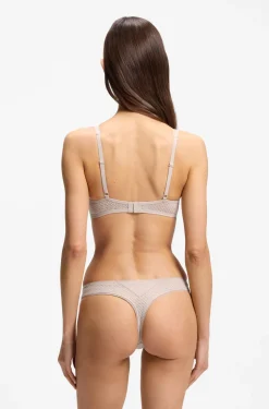 Low-rise briefs with lace and gold accents