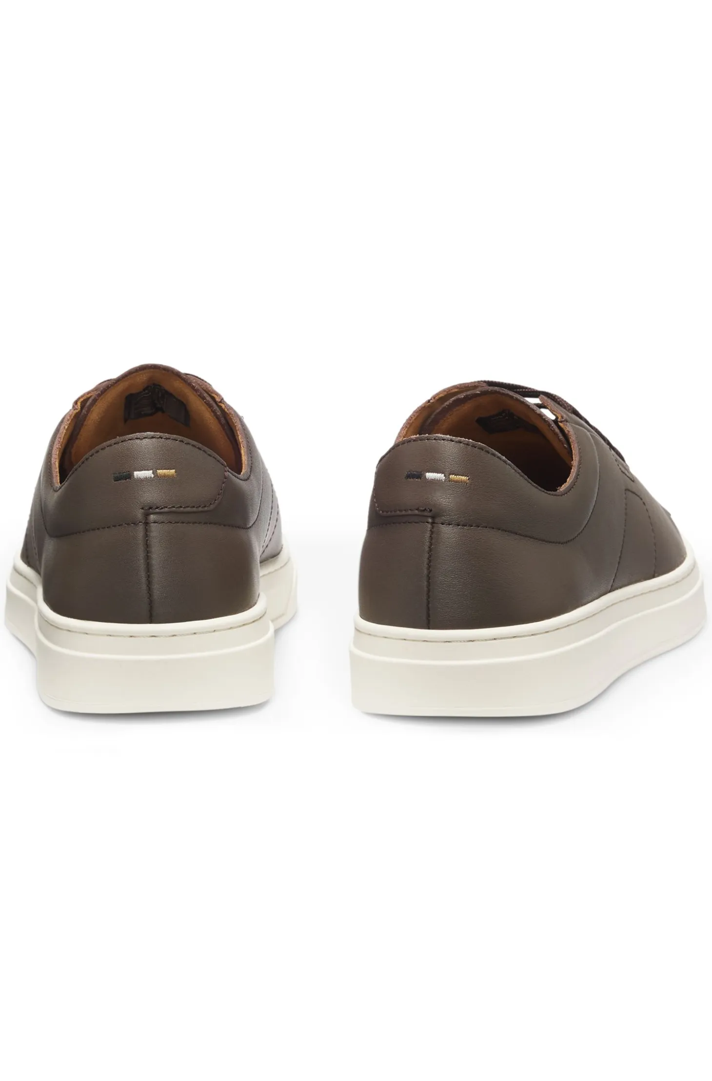 Low-top trainers in leather with embossed logo
