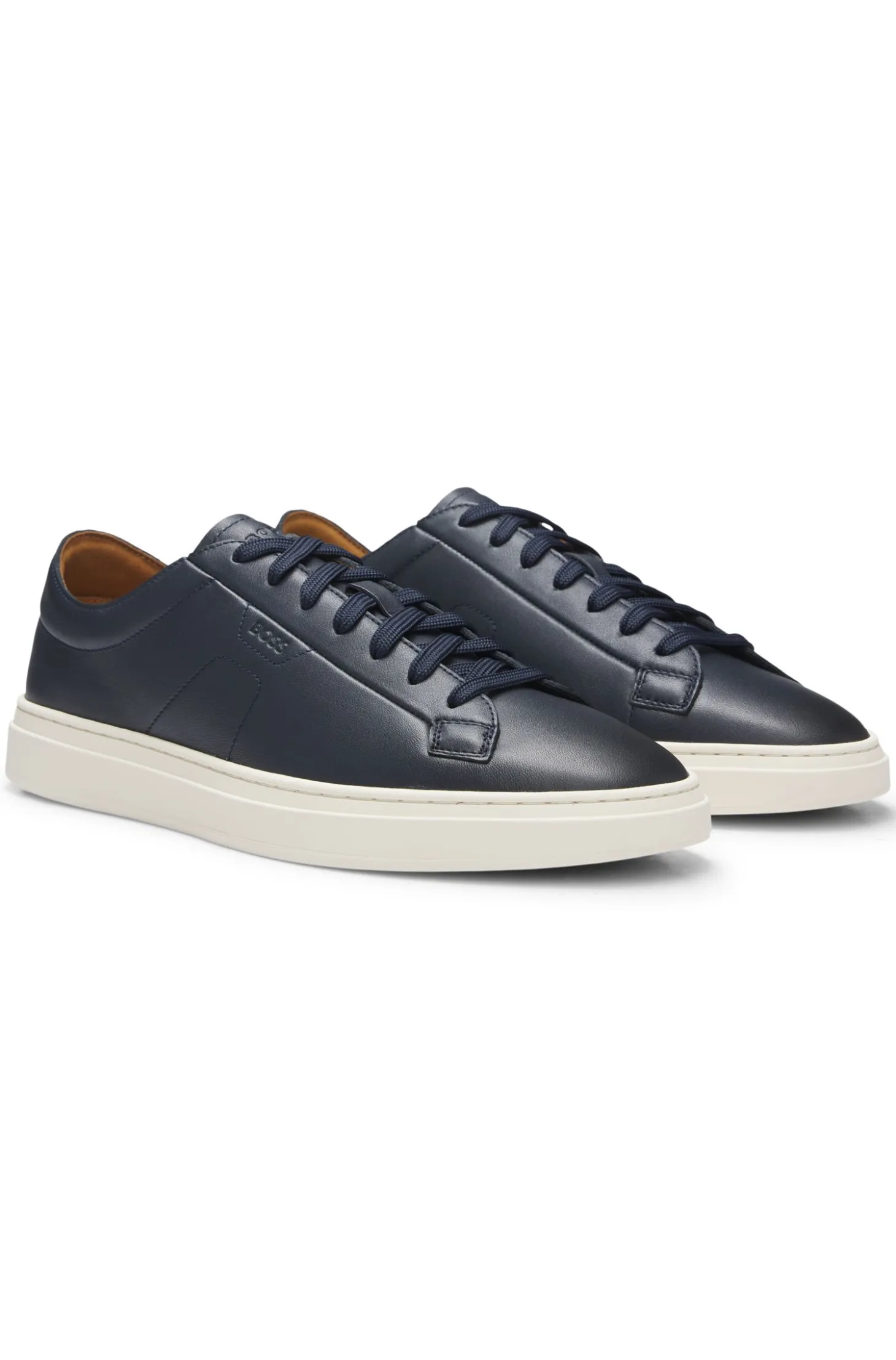 Low-top trainers in leather with embossed logo