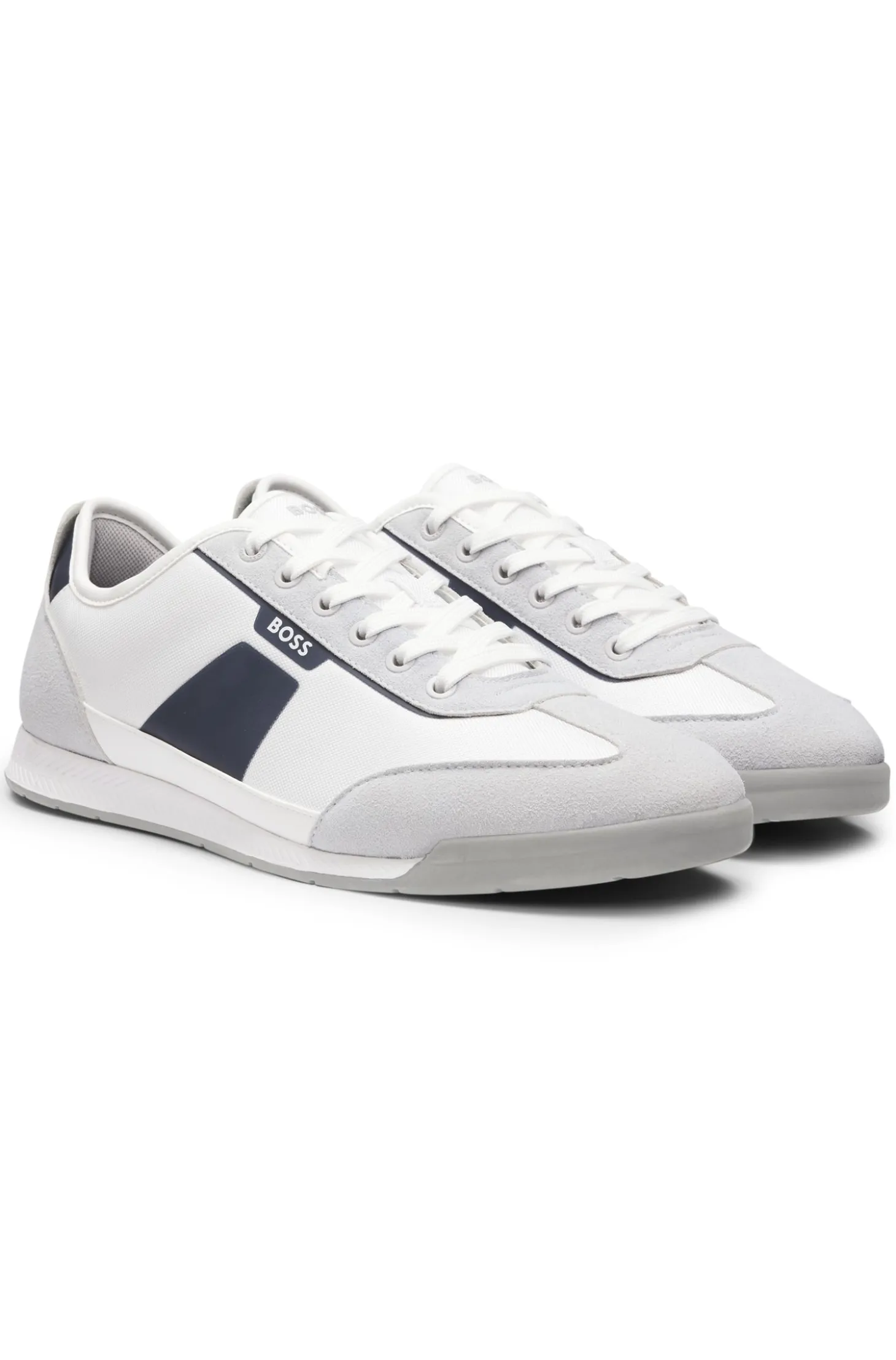 Low-top trainers with structured trims