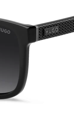 Matte-black sunglasses with patterned temples