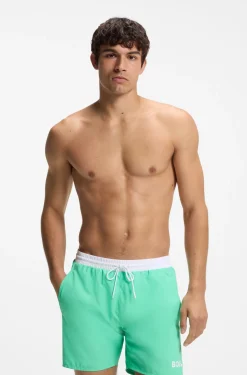 Medium-length swim shorts with contrast details