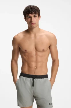 Medium-length swim shorts with contrast details