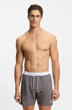 Medium-length swim shorts with contrast details
