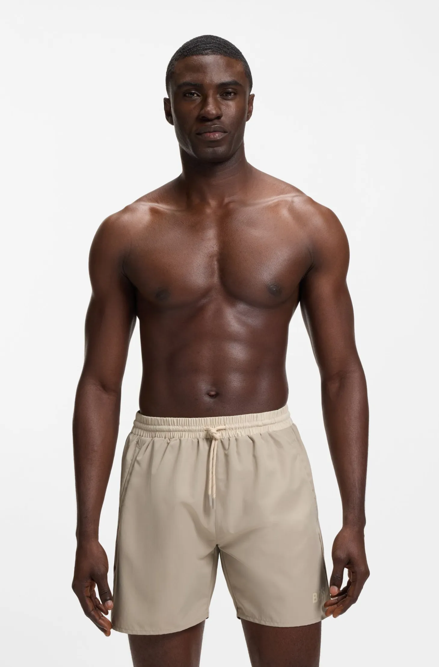 Medium-length swim shorts with contrast details