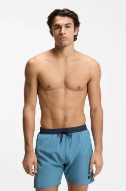 Medium-length swim shorts with contrast details