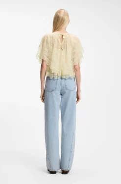 Mini cape blouse with lace trimmings