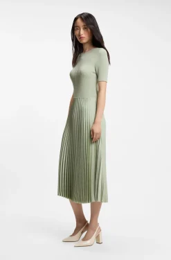 Mixed-material dress with plissé skirt