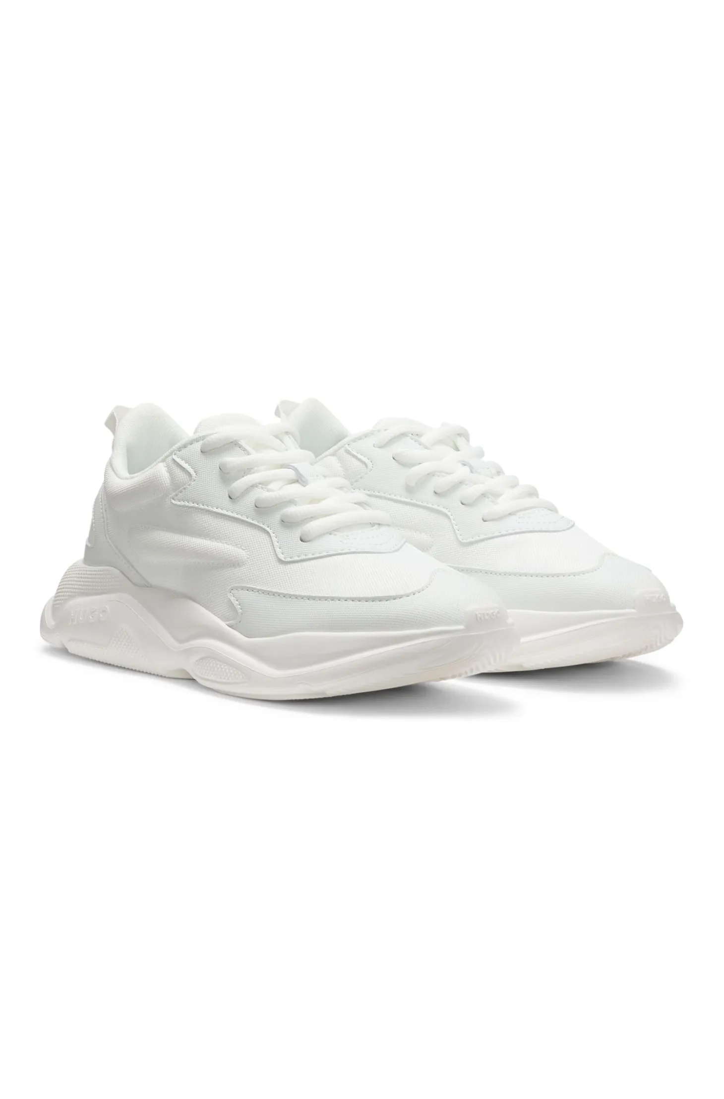 Mixed-material lace-up trainers with counter logo