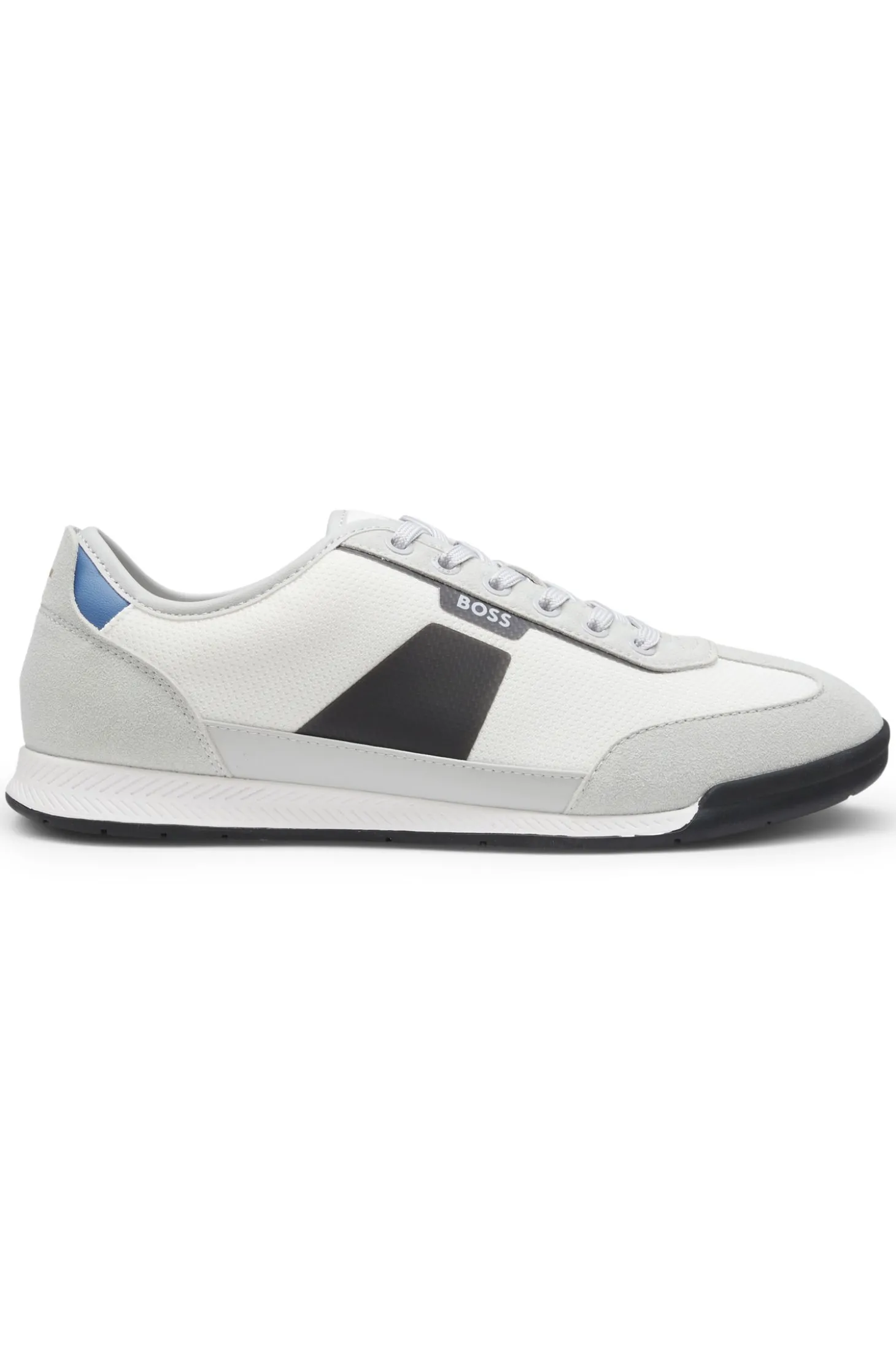 Mixed-material trainers with ridged outsole