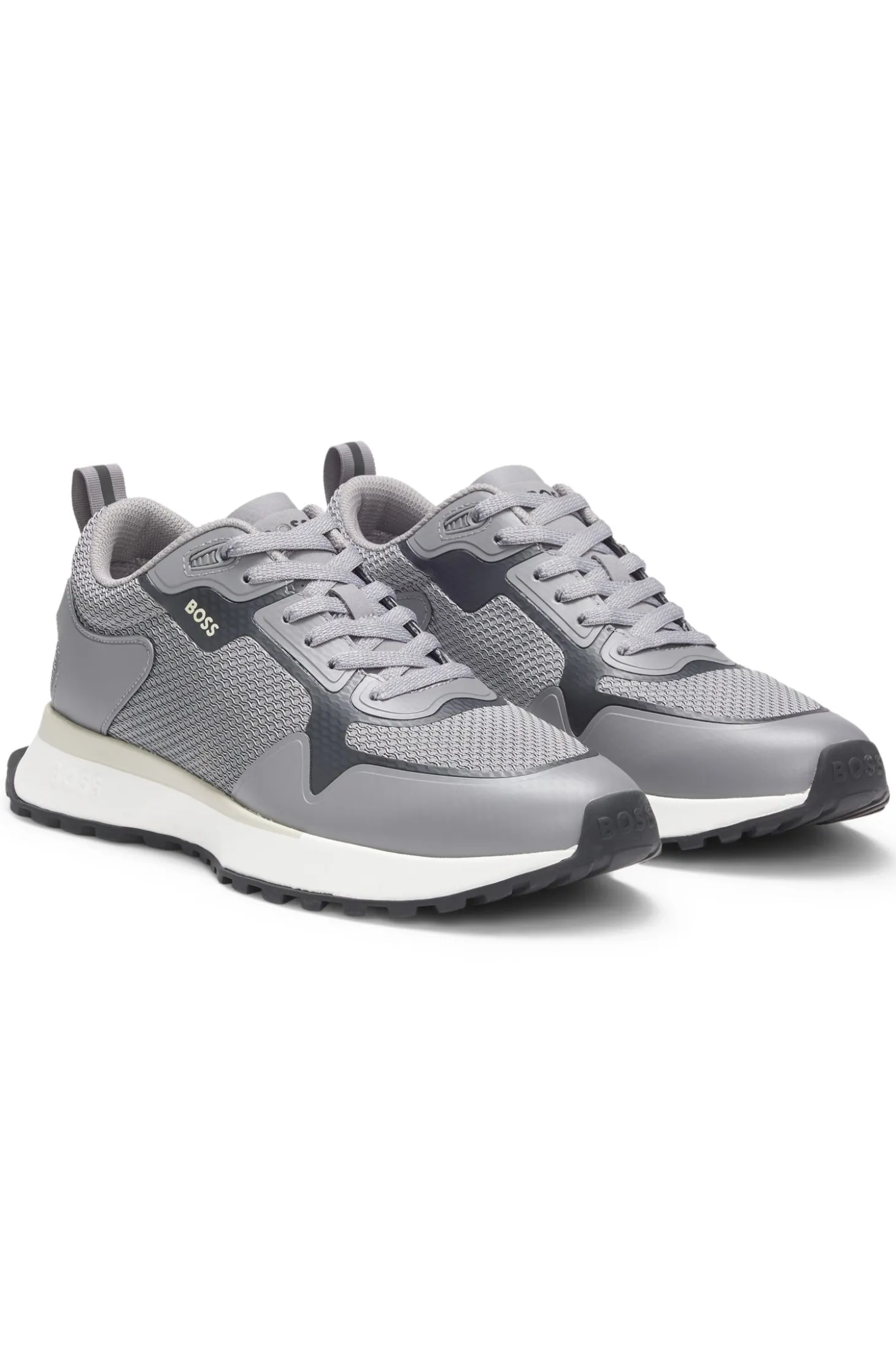 Mixed-material trainers with mesh details and branding