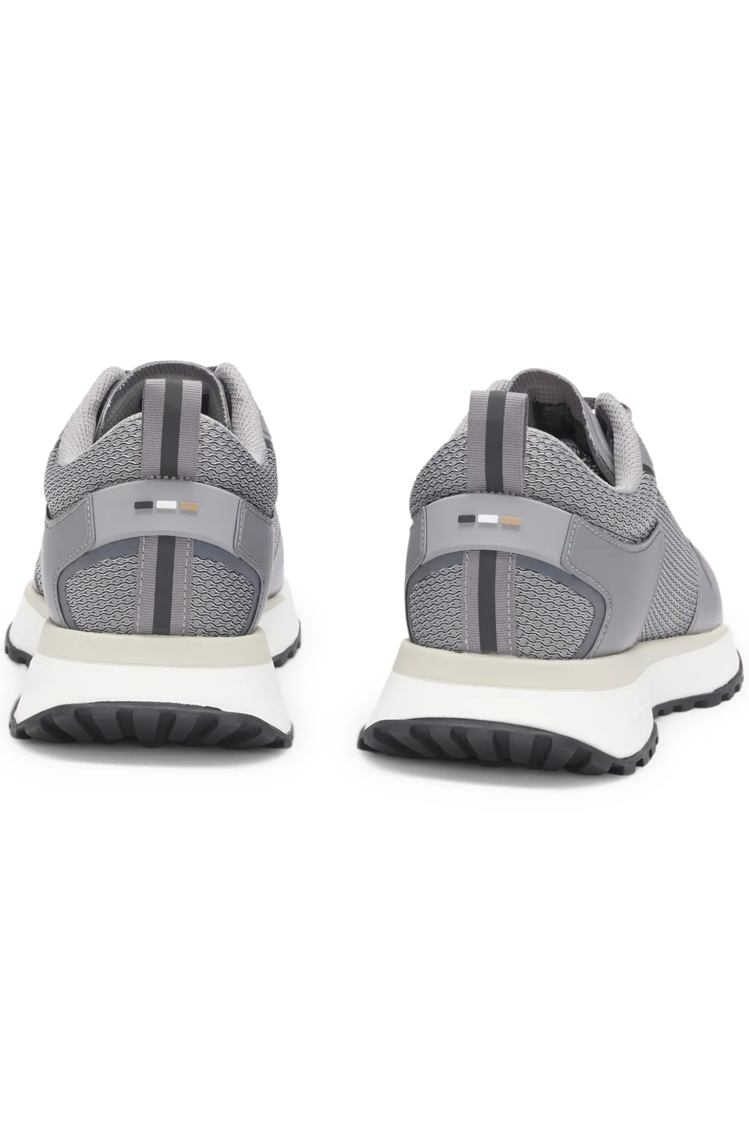 Mixed-material trainers with mesh details and branding
