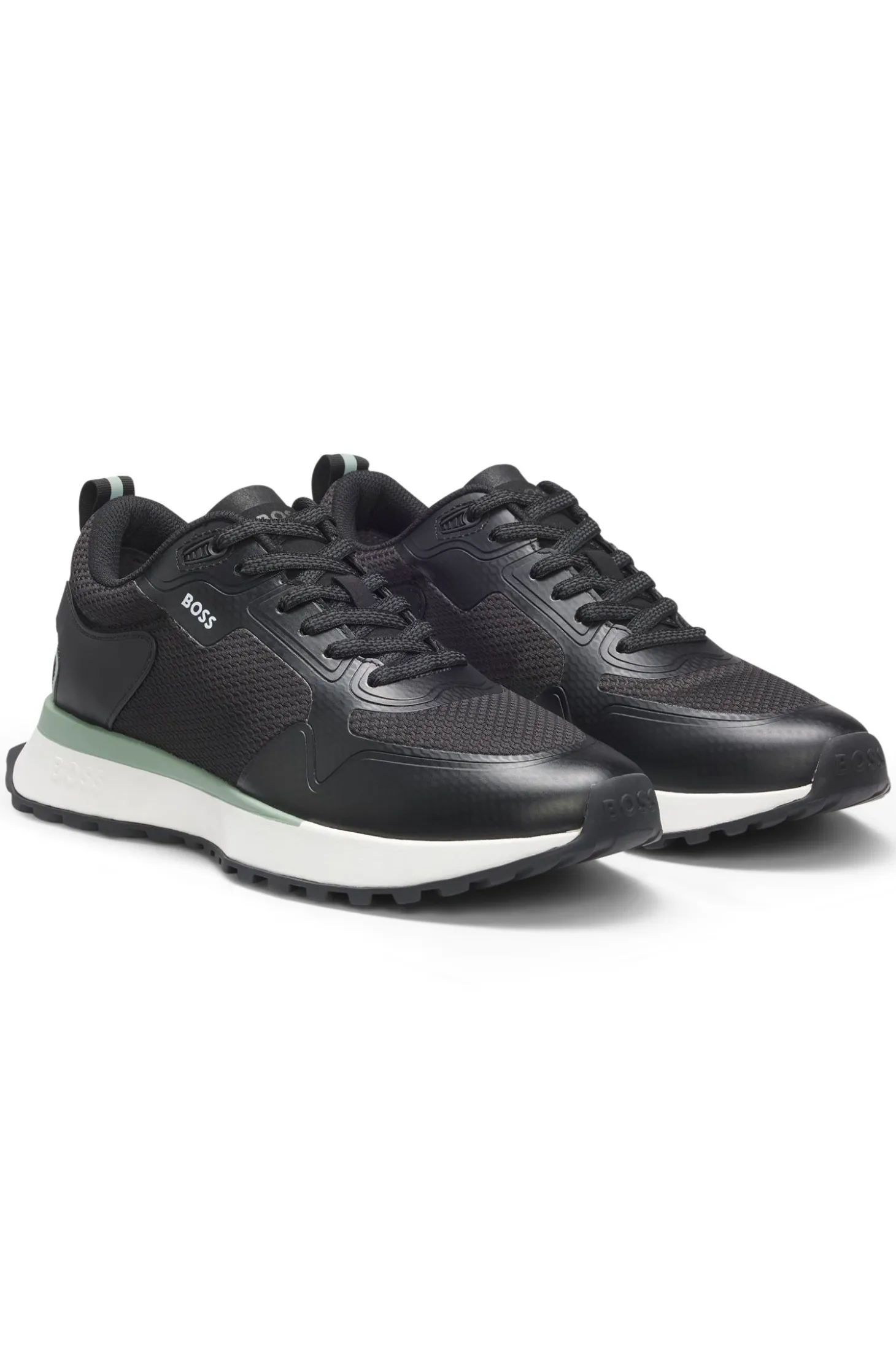 Mixed-material trainers with mesh details and branding