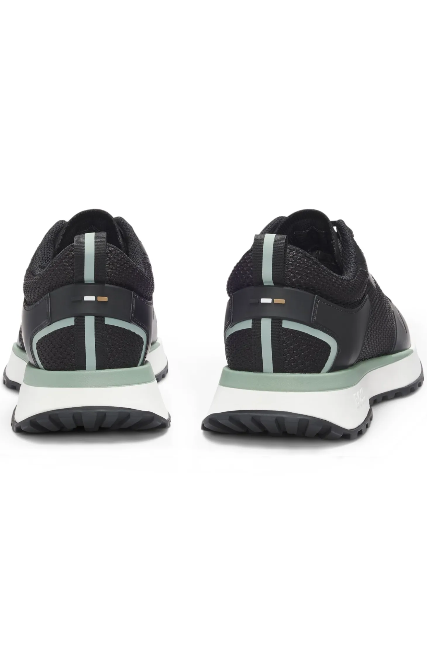 Mixed-material trainers with mesh details and branding