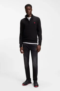 Mixed-material trainers with branded accents