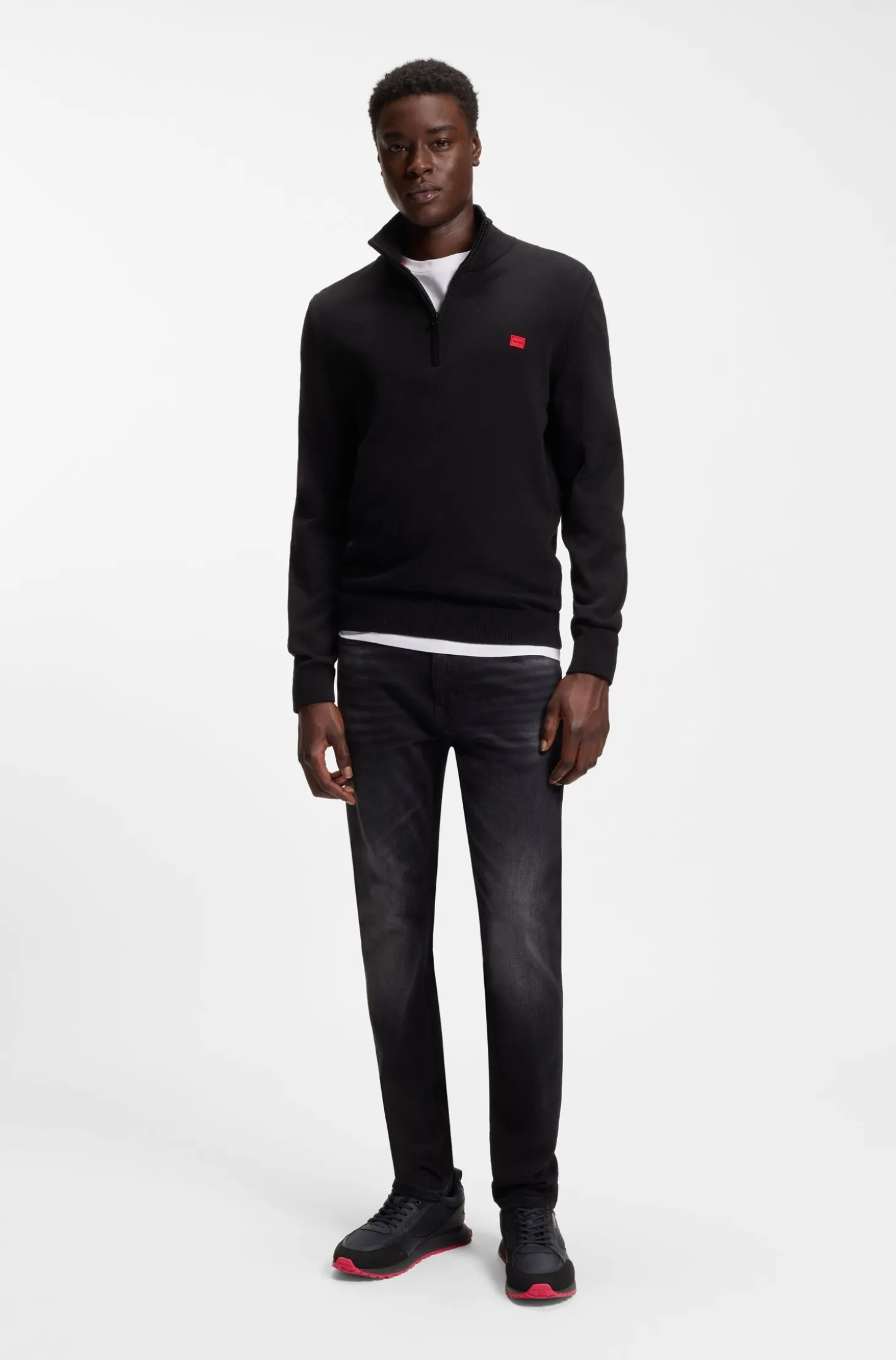 Mixed-material trainers with branded accents