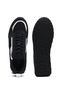 Mixed-material trainers with branded accents