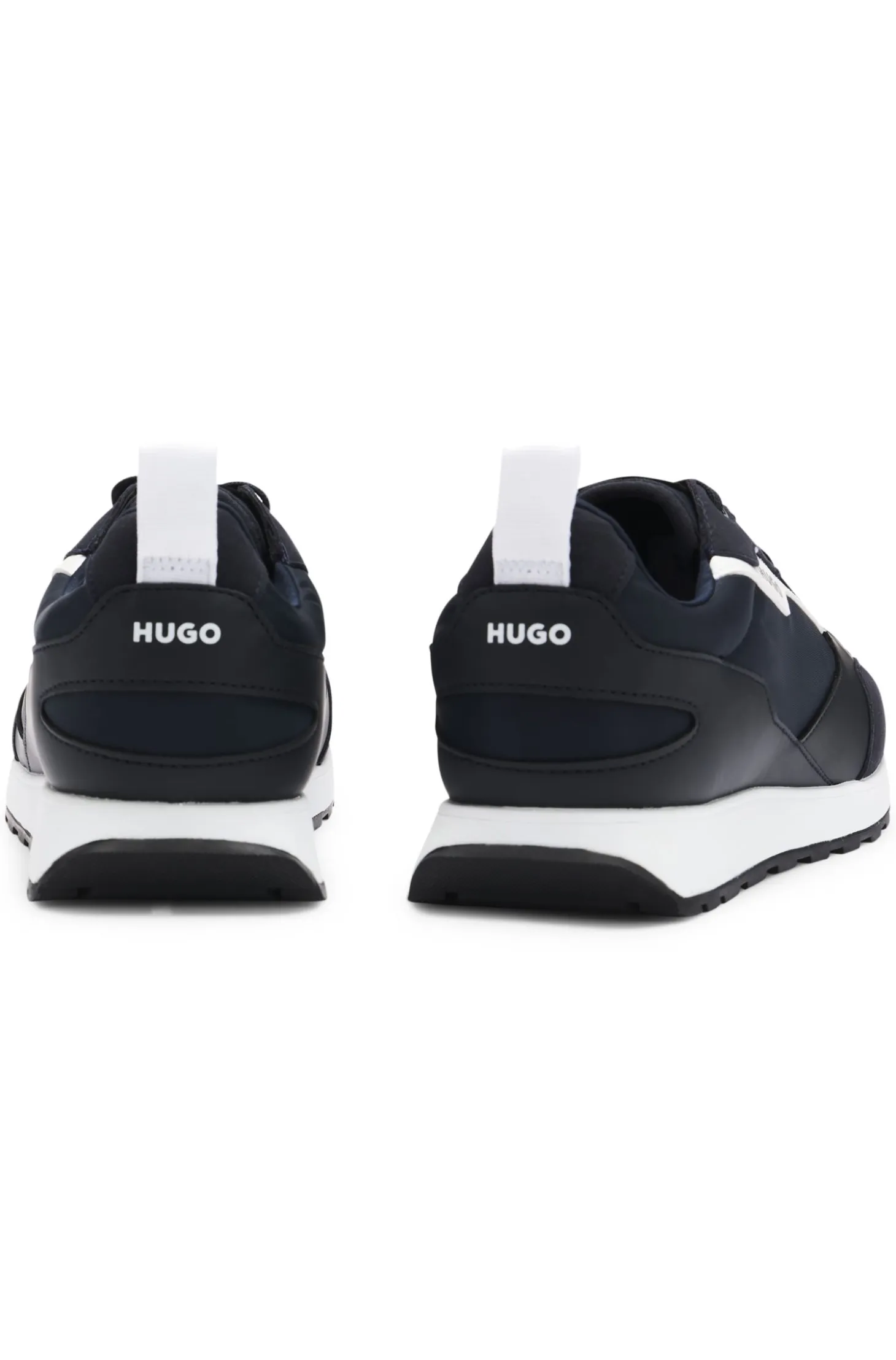 Mixed-material trainers with branded accents