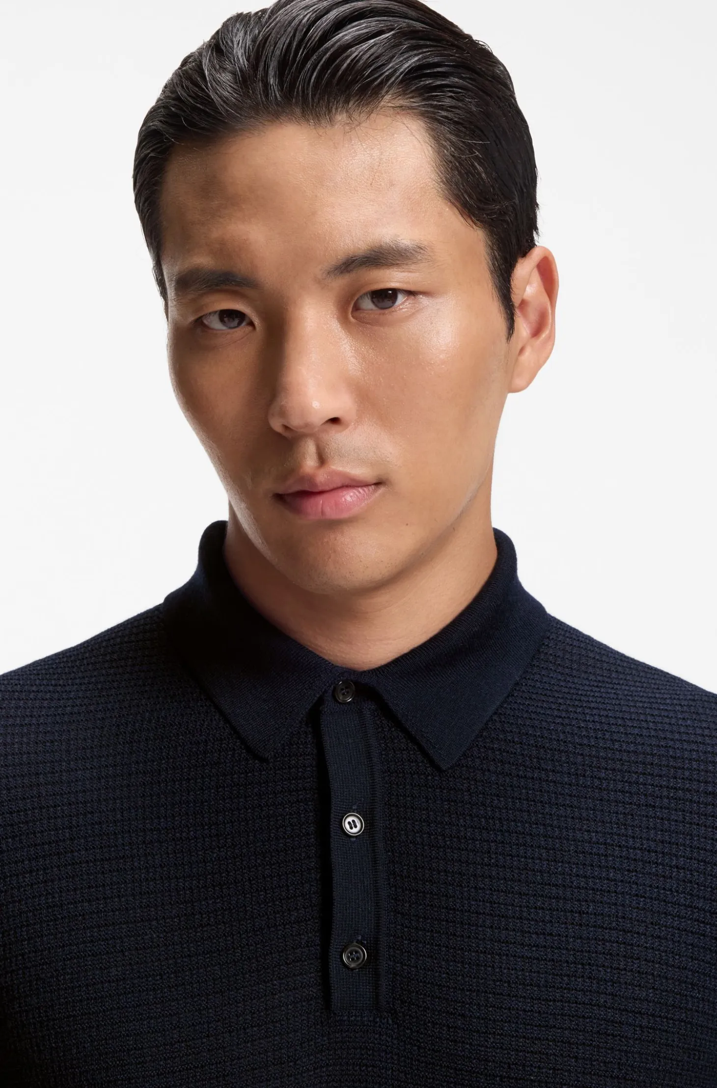 Mixed-structure knit polo in a wool blend