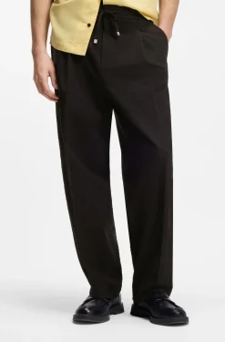 Modern-fit trousers in stretch-cotton seersucker