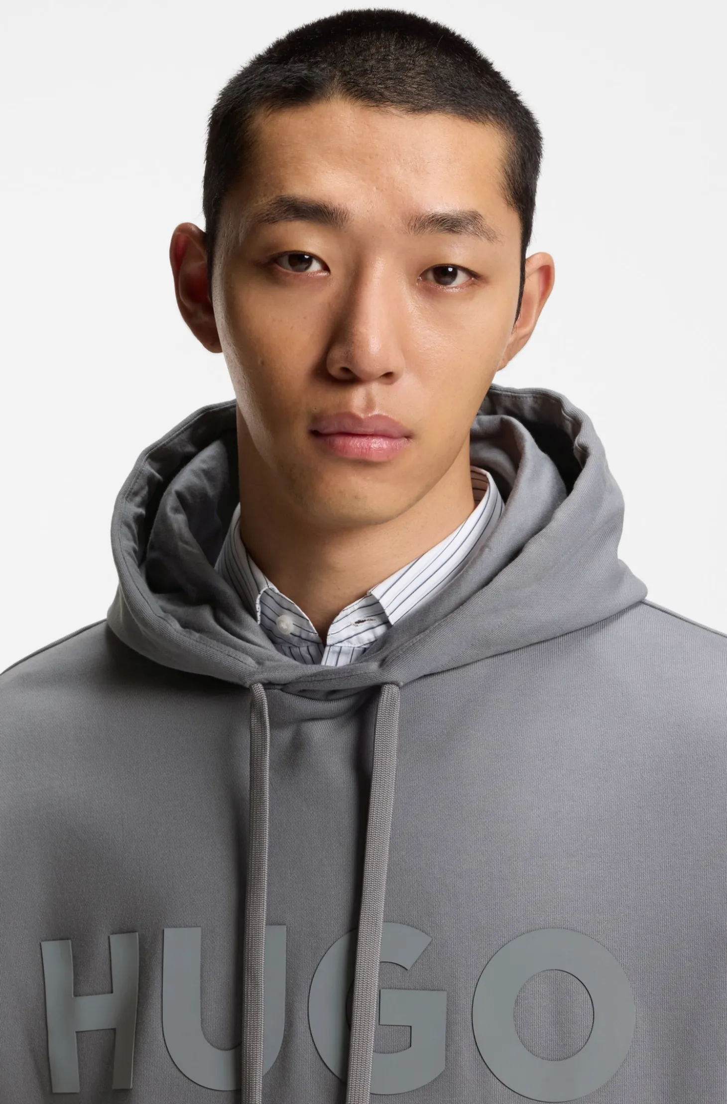 Oversized-fit hoodie in cotton terry with reflective logo
