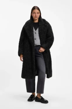 Oversized-fit teddy coat with double-breasted closure