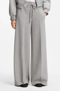 Oversized-fit trousers in melange stretch twill