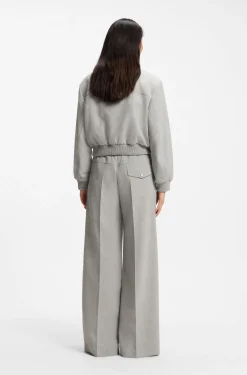 Oversized-fit trousers in melange stretch twill