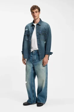 Oversize-fit denim overshirt with paint splashes