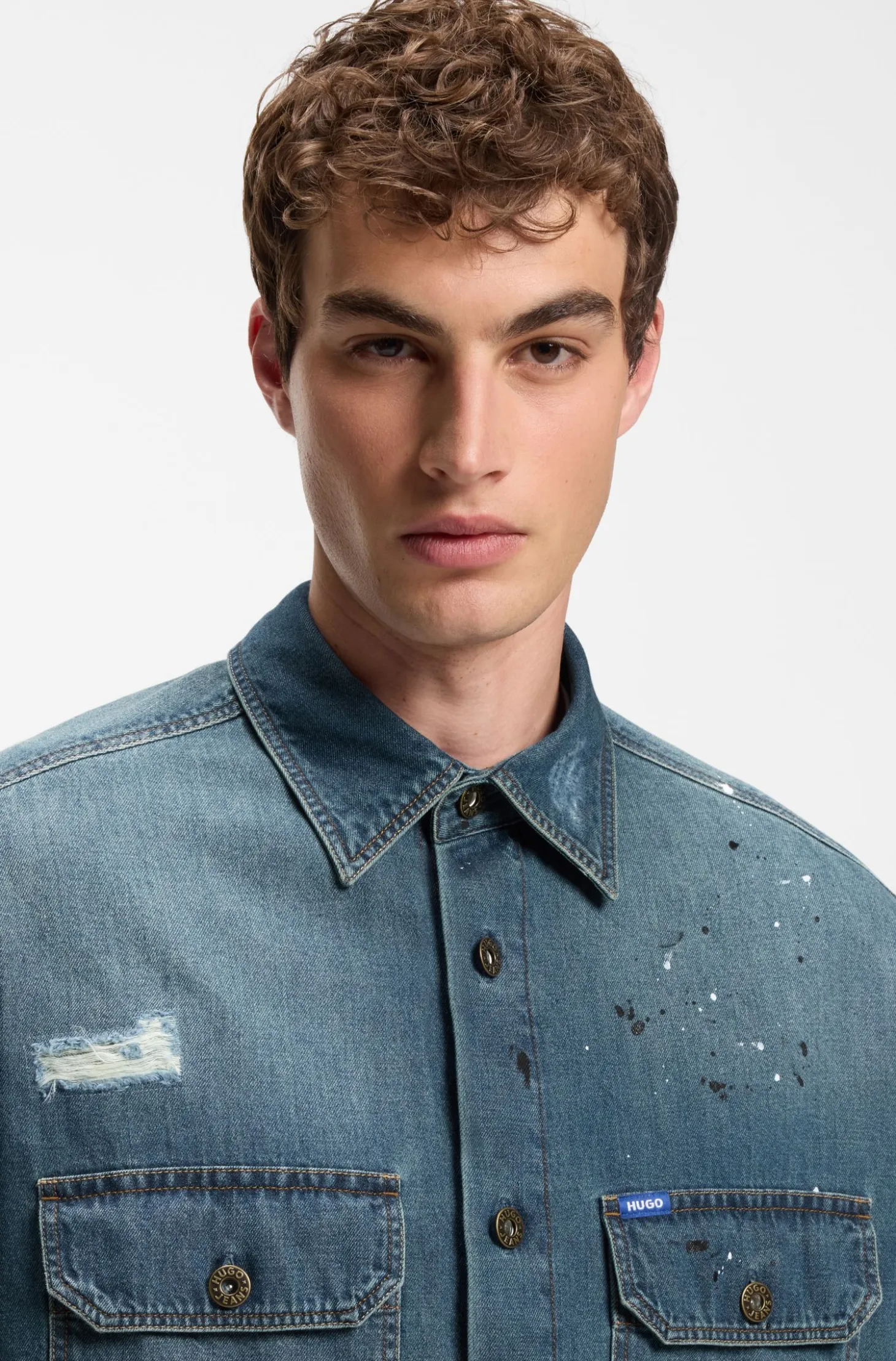 Oversize-fit denim overshirt with paint splashes
