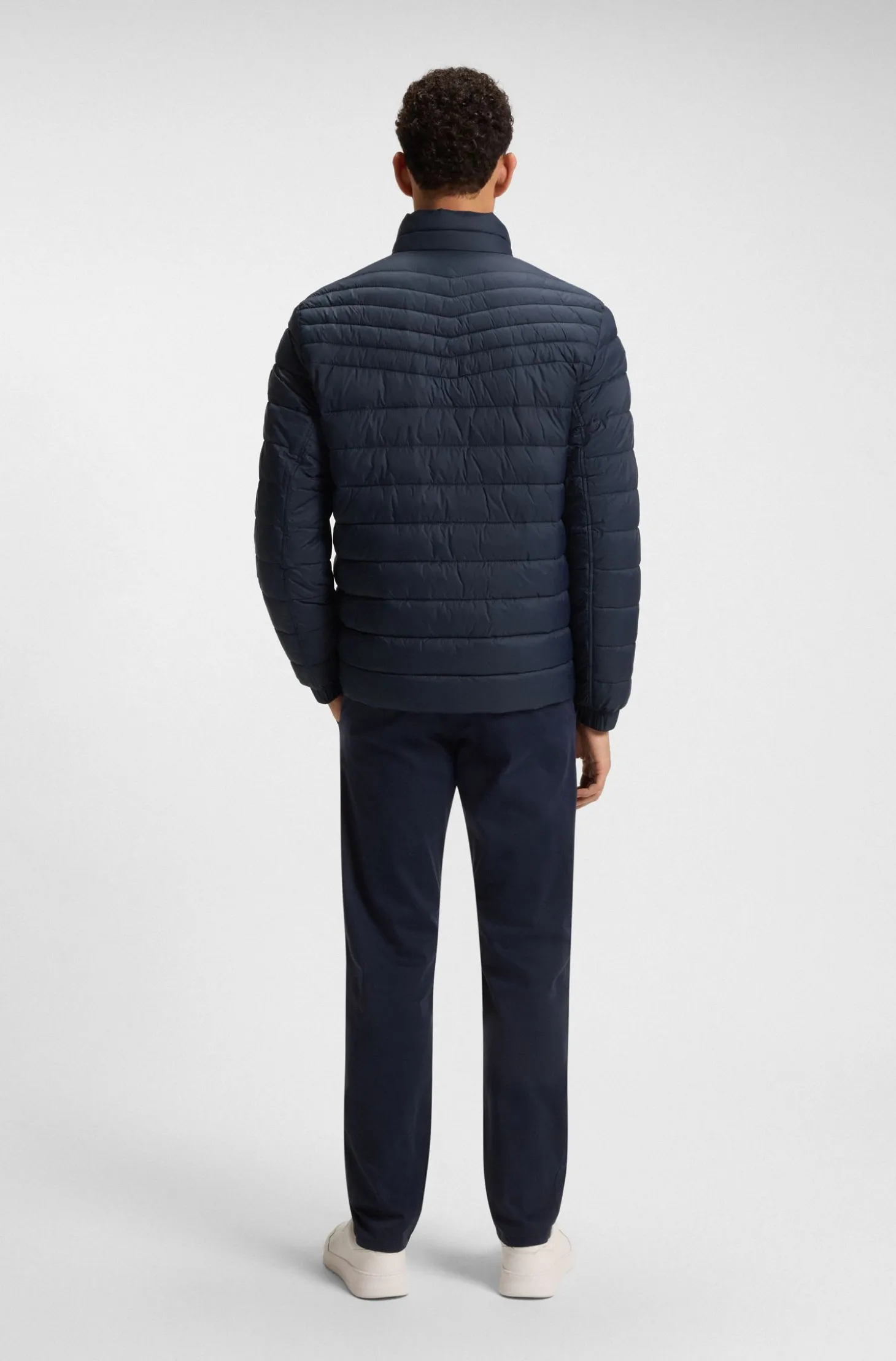 Packable water-repellent padded jacket with logo badge