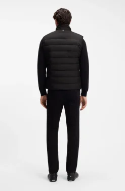 Padded gilet with a protective stand collar