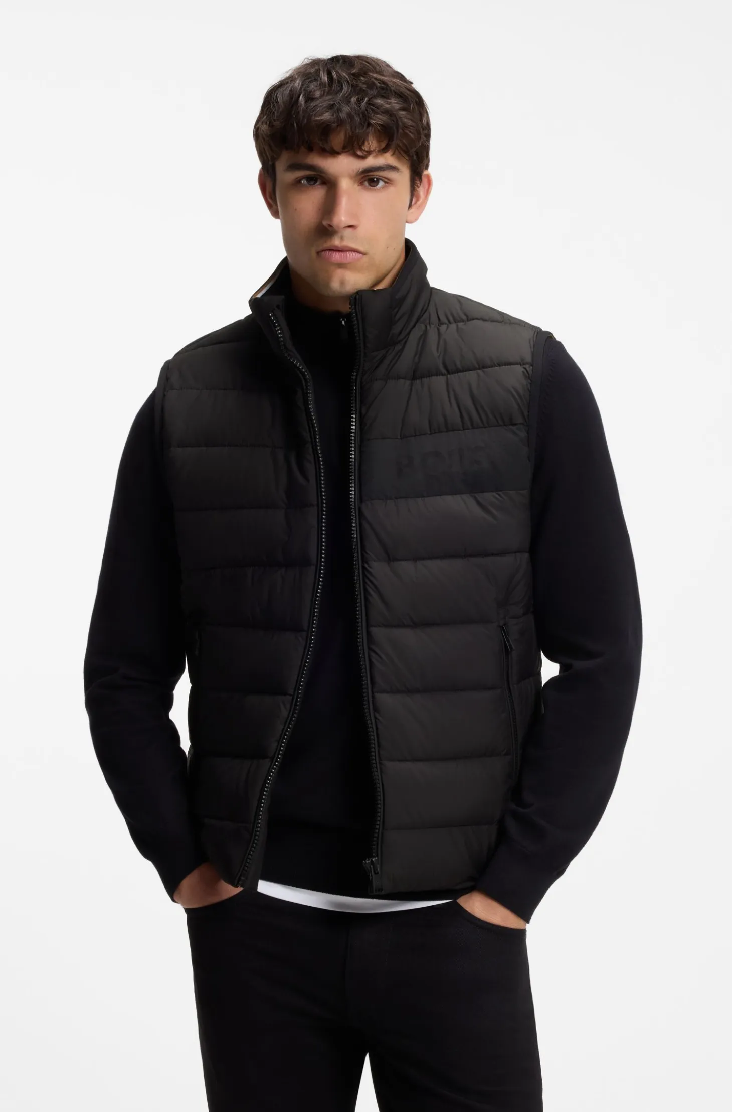 Padded gilet with a protective stand collar