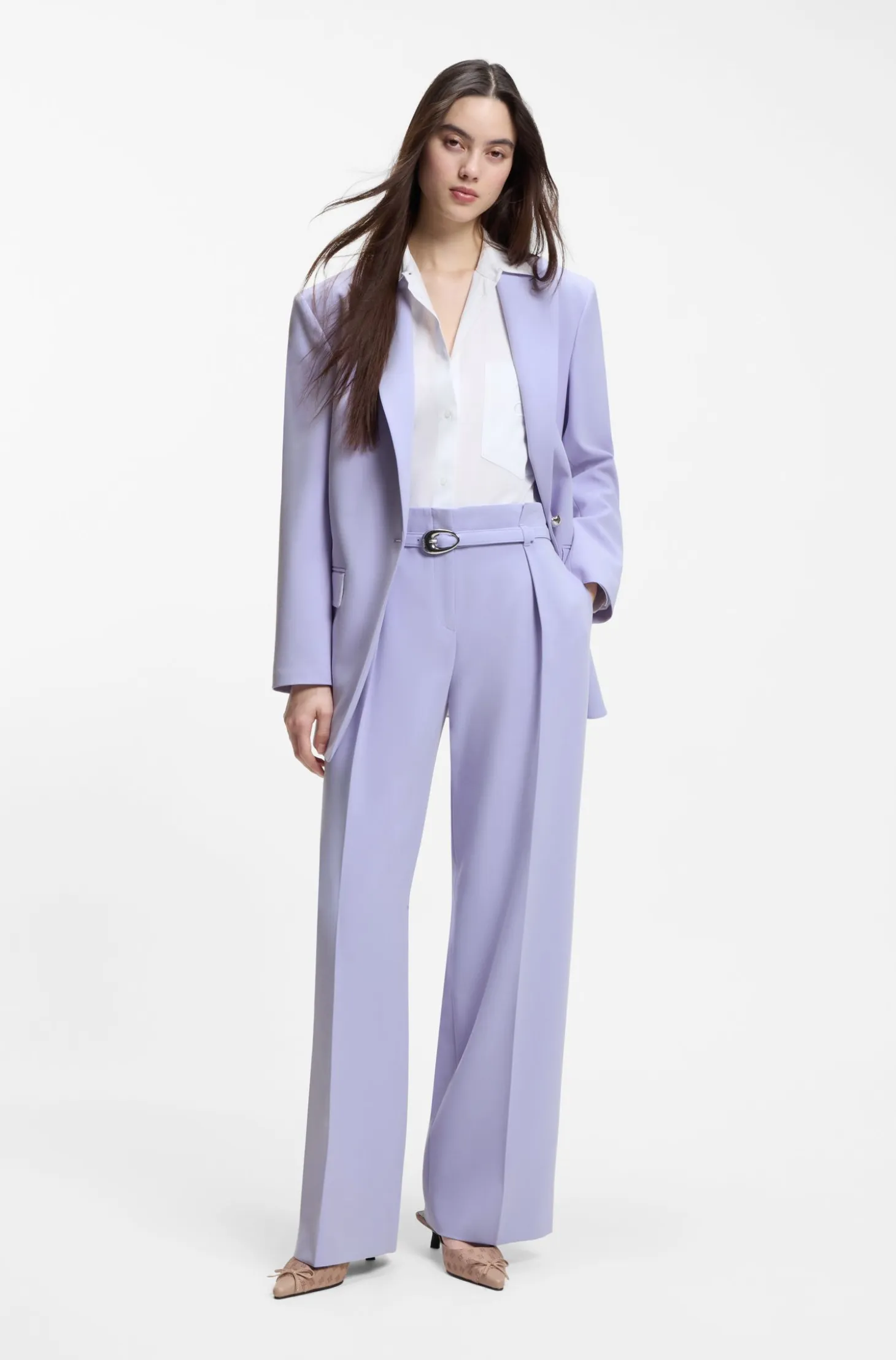 Pleat-front trousers with buckled belt