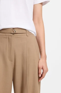 Pleat-front trousers with buckled belt