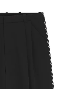 Pleat-front trousers with whipstitch details
