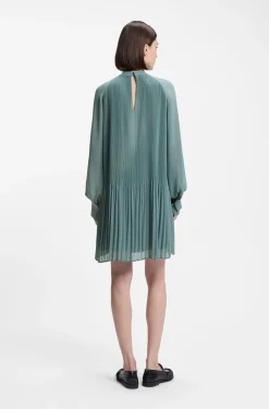Plissé dress with sheer sleeves