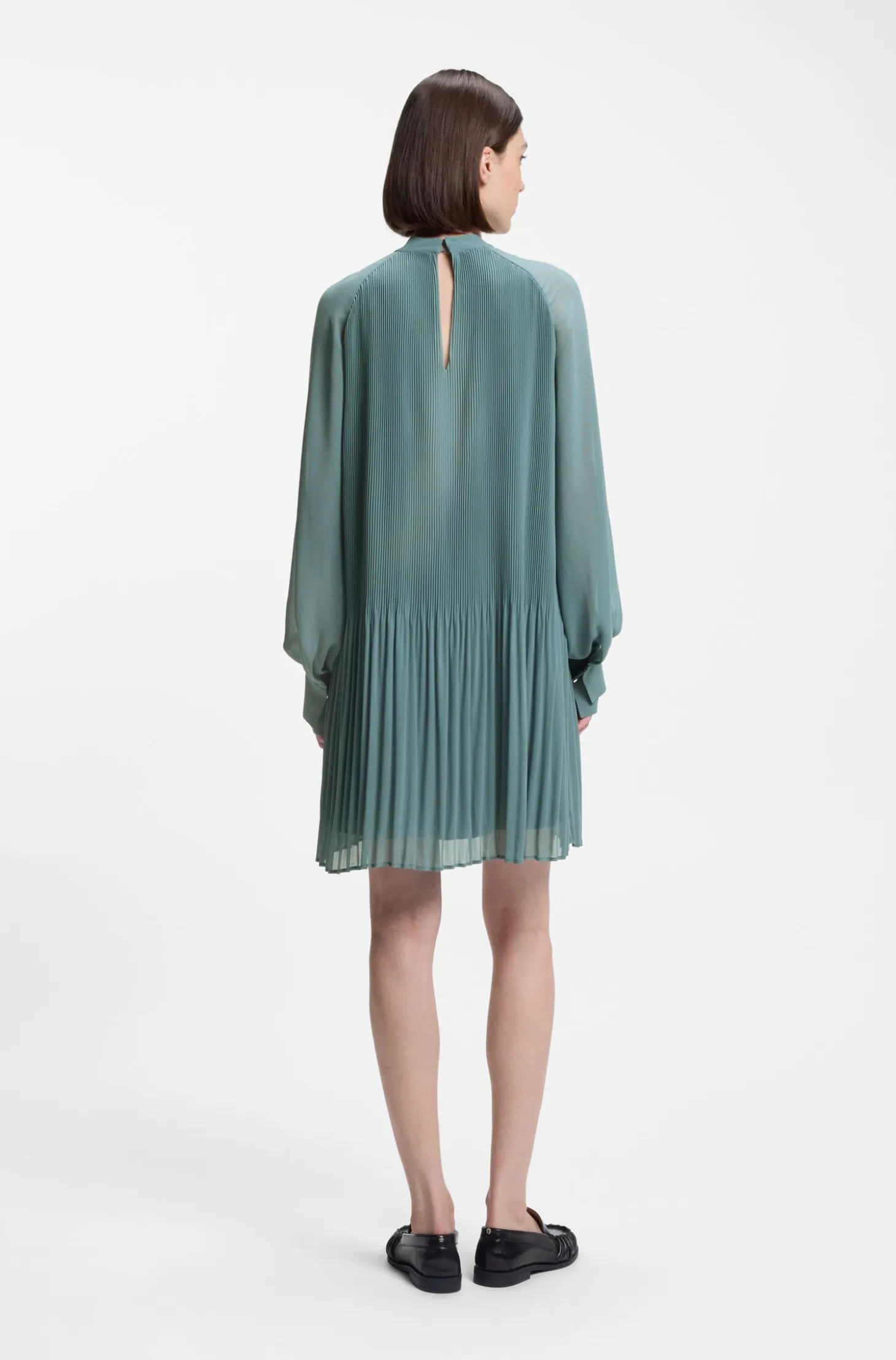 Plissé dress with sheer sleeves