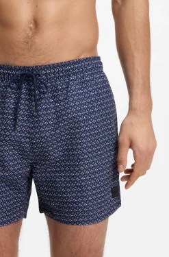 Printed swim shorts with logo badge