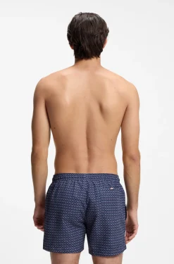 Printed swim shorts with logo badge