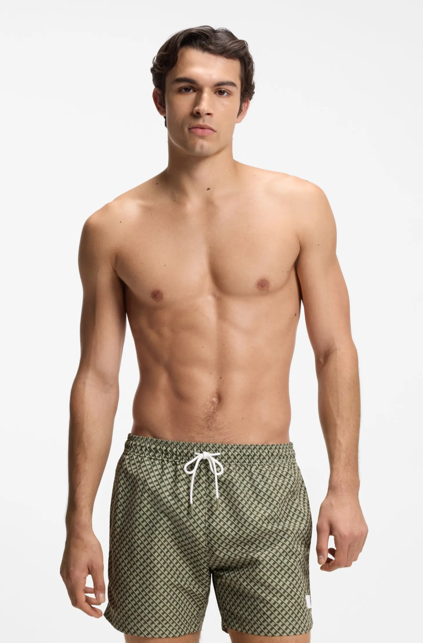 Printed swim shorts with logo badge