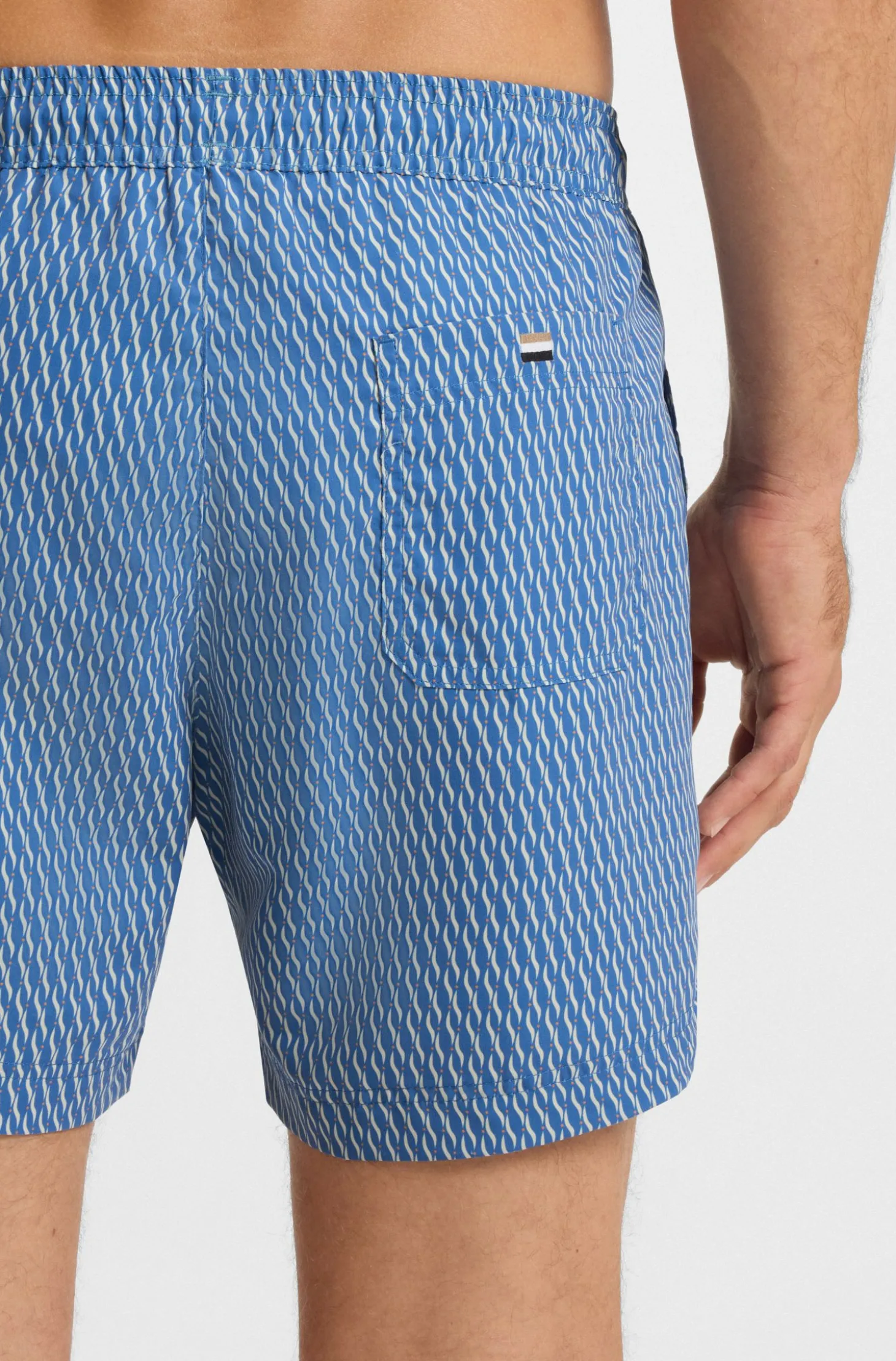 Printed swim shorts with logo badge