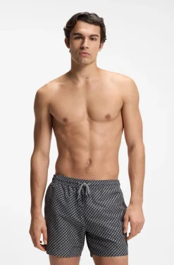 Printed swim shorts with logo badge